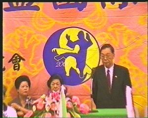 Master Shu gives opening address with backdrop of the professor in background